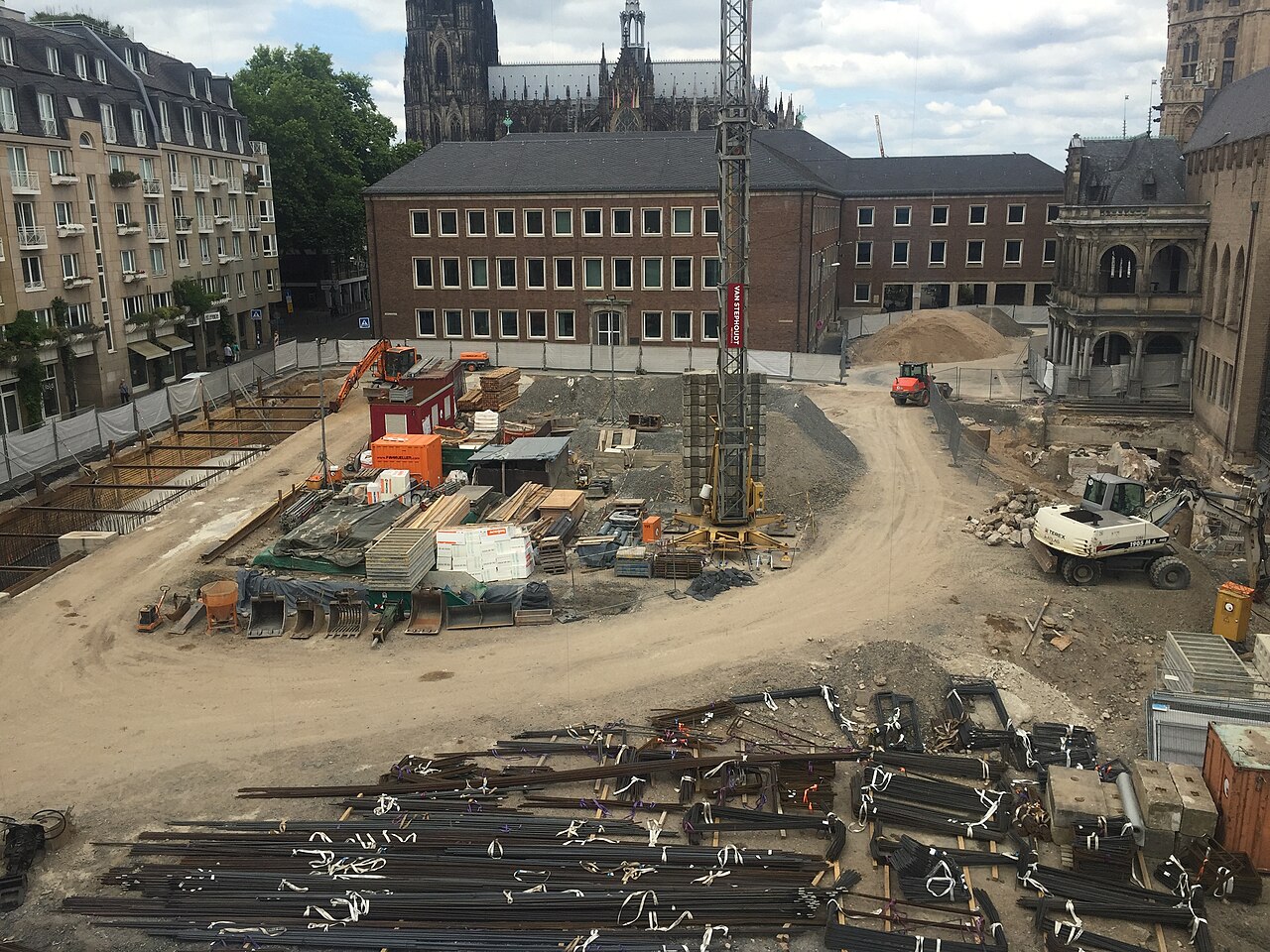 An active construction site with structural framing